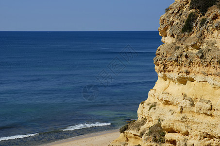 海滩沙滩水库蓝色旅行橙子反射场景地标风景日出砂岩图片