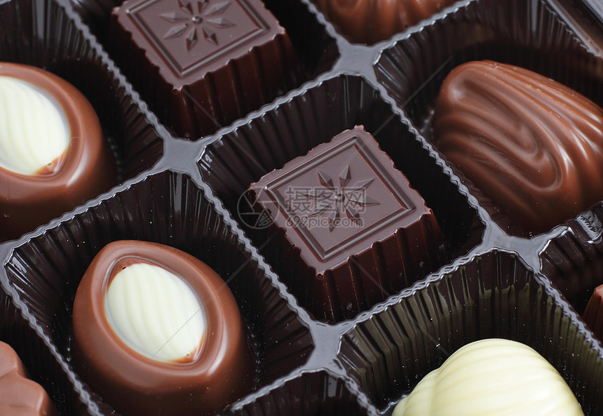 巧克力盒糖果甜点垃圾小吃食物松露宏观牛奶盒子塑料图片