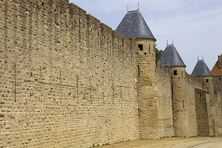 卡尔卡松爬坡墙壁旅游城市城堡石头建筑学力量历史历史性图片
