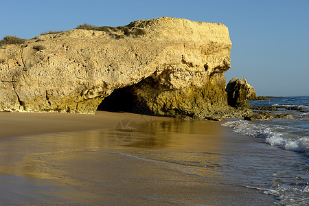 海滩沙滩蓝色日出环境国家巨石水库风景反射场景橙子图片