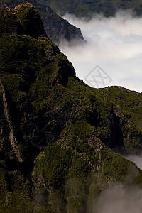 雾岩石天堂薄雾石头悬崖天空地球风景太阳荒野图片