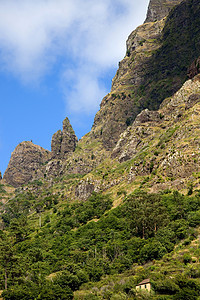 山脉地球薄雾悬崖天堂岩石旅行首脑荒野太阳天空图片