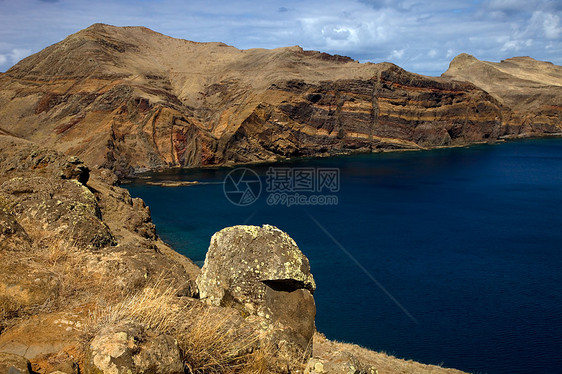 马德拉海岸波浪火山石头海岸线半岛太阳天空蓝色旅游图片