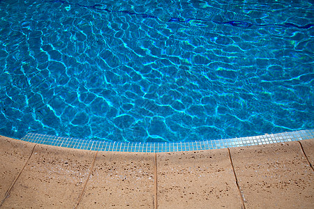 游泳池阳光气泡娱乐温泉旅行圆圈水池闲暇边界蓝色图片