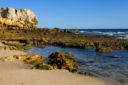 海滩沙滩蓝色场景悬崖海岸旅行岩石国家巨石风景水库图片