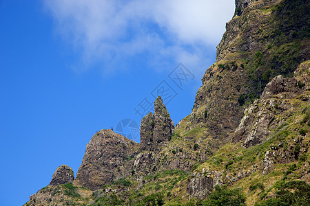 山脉天空旅游远景天堂蓝色悬崖天气薄雾首脑爬坡图片