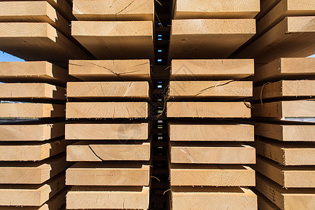 在木材厂的木板堆成一堆新的木板地面木头材料院子风格纤维栅栏装饰酒吧硬木背景图片