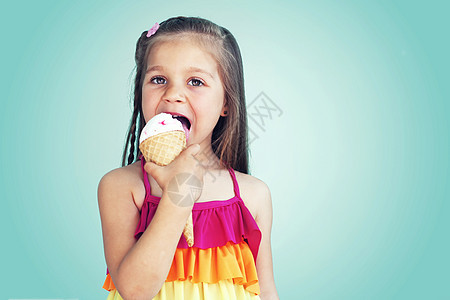 儿童吃冰淇淋锥体快乐乐趣女孩甜点孩子食物牙齿奶油生活图片