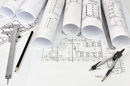 建筑设计师的绘画和工具工程蓝图房子草稿圆规工程师游标线条铅笔卷轴图片