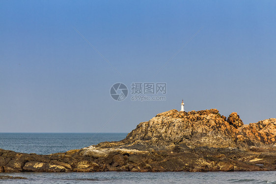 GOA海滩上的岩石支撑野生动物海岸石头海岸线海景天空图片