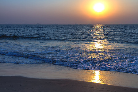 海滨日落反射野生动物天空海洋海景情绪海浪日落海岸海岸线图片