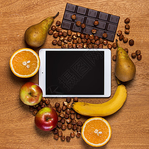 厨房 平板和食品面包香蕉屏幕巧克力桌子用具技术触摸屏厨具厨师图片