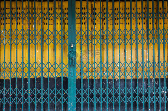 旧式钢门曲线金属黄色入口建筑学古董图片