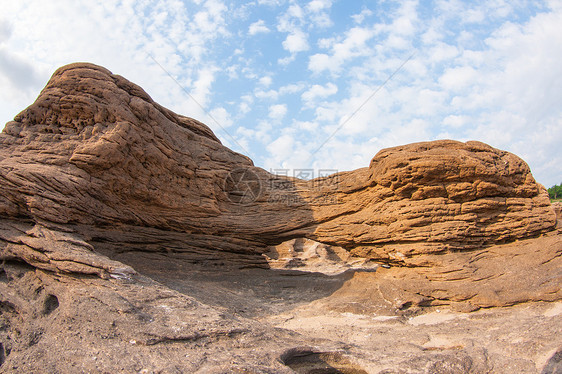 萨姆潘博克热带沙漠鸿沟河岸沟壑场景天空火山石头蓝色图片
