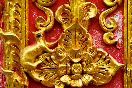动物在Stucco工作上艺术金子文化宝石竹子奢华古董装饰品红色手工图片