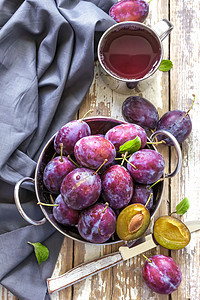 普拉姆果汁枝条美食花园桌子紫色液体水果食物烹饪午餐图片