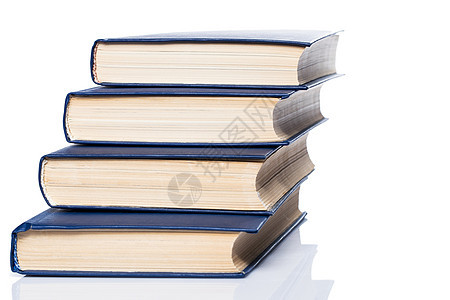 书籍 白色背景的旧书堆叠木头阅读科学学校学习床单收藏圣经知识头书图片