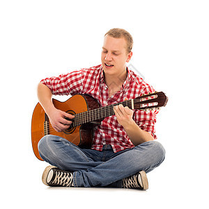 年轻音乐家配吉他音乐摇杆衣服艺术家流行音乐牛仔裤男性乐器岩石男人图片