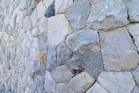 巨石墙鹅卵石壁板建筑围墙花岗岩石墙结构建材建造纹理图片