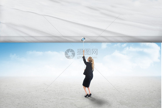 商业女商务人士的复合图像拉着白色屏幕商务女性头发绘图专注浅色职业套装金发沙漠图片