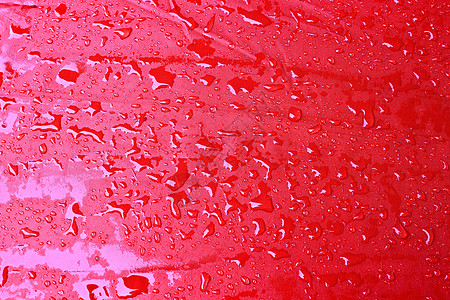 雨伞上滴水雷雨雨滴红色气象纺织品天气液体季节宏观图片