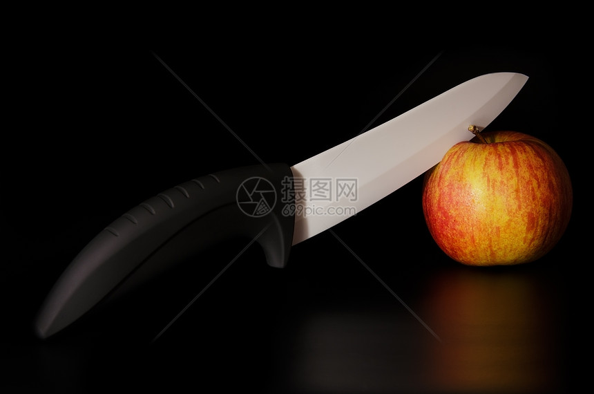 刀和苹果背景摄影食物维生素陶瓷制品厨房红色水果烹饪图片