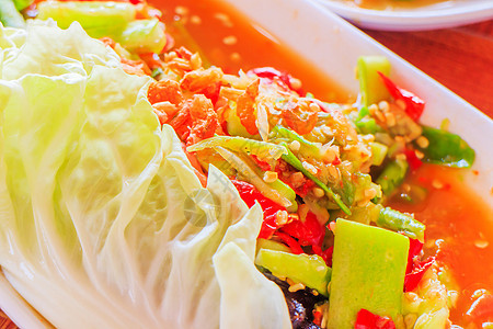 绿木瓜沙拉热带烹饪早餐美食辣椒盘子水果饮食香料蔬菜图片