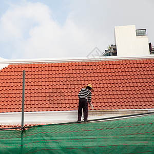 画家工作头盔安全男人建筑建设者梯子工匠画笔滚筒图片