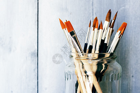 油漆和刷子黑色工作室画家画笔补给品爱好绘画工艺艺术蓝色图片