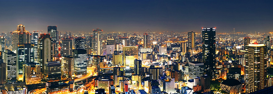 城市公路夜景日本大阪全景 晚上 日本建筑物建筑学公寓商业摩天大楼观光地标市中心蓝色场景背景