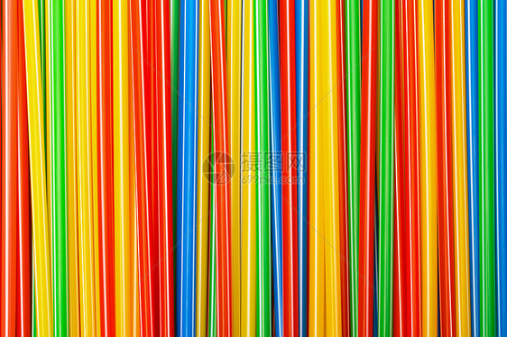 彩色塑料灌草的背景背景情况圆形白色彩虹管道宏观绿色管子乐趣饮料红色图片