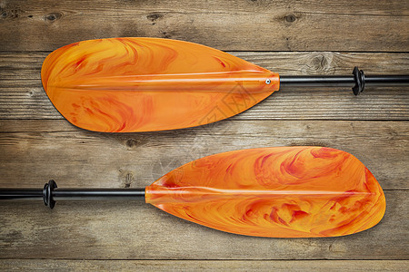 彩色的皮艇桨橙子木头红色风化运动黄色塑料娱乐背景图片