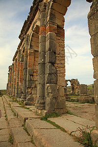 Volubilis 火山卷石灰石寺庙历史城市废墟历史性旅游柱子建筑观光图片