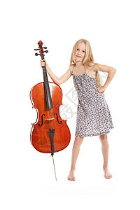 身着服装和大提琴的少女字符串孩子工作室幸福金发专注教育木头爱好音乐会图片