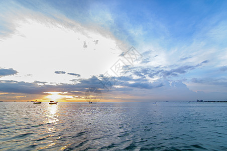 日落海滩 邦普拉衬垫热带旅游橙子血管晴天运输巡航海洋海浪图片