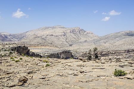 Jebel 广场景观旅游地质学骨折冒险丘陵峡谷荒野探索沙漠天空图片