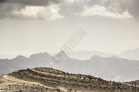 Jebel 广场景观旅游峡谷旱谷荒野沙漠探索旅行丘陵天空骨折图片