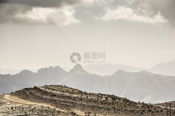 Jebel 广场景观旅游峡谷旱谷荒野沙漠探索旅行丘陵天空骨折图片