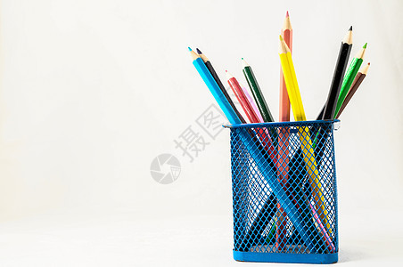 箱容器中新的彩色笔办公室艺术画笔蜡笔草图铅笔工具橙子艺术家乐器图片