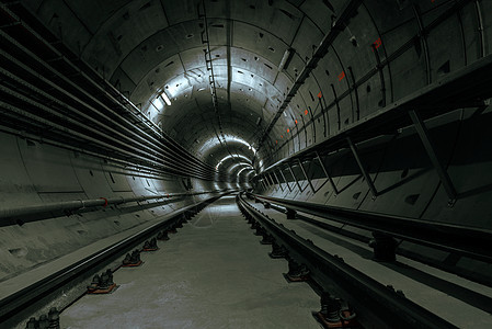 地铁的地下隧道旅行车站建造线条铁路环径运输金属商业管道图片