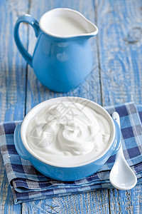 酸酸奶油饮食食物生物奶油酸奶厨房鞭打木头牛奶产品图片