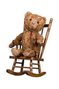 木椅上的老泰迪熊扶手椅闲暇白色玩具熊木头棕色童年休息椅子玩具图片