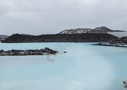 温水擦浴位于Wnter的蓝环礁地热浴胜地观光地热矿物质洗澡水池火山地质学温水治疗温泉背景