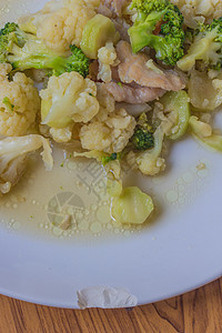 炒菜花和牡蛎酱服务食物花序小吃陶瓷午餐早餐脆皮饮食勺子图片