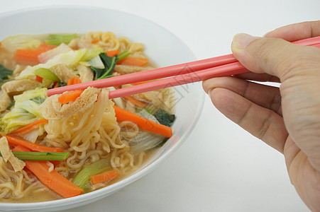 吃面和清汤 用筷子吃素食背景图片