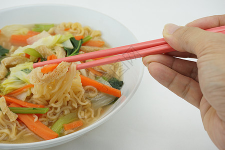 吃面和清汤 用筷子吃素食图片