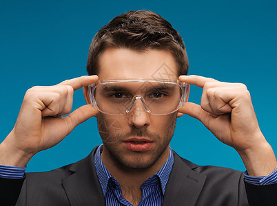 戴保护眼镜的商务人士企业家配饰商业安全技术蓝色男性工人职员套装图片