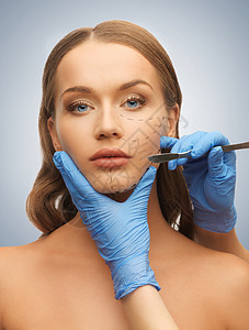 妇女的脸部和美容的手化妆品皱纹保健手套程序手术药品刀刃临床皮肤图片