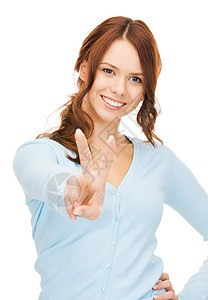 妇女展示胜利或和平迹象商务女性女孩微笑学生优胜者成功人士青年手势图片