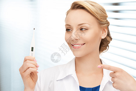 具有温度计的有吸引力的女医生测量专家工具女孩实验室女士微笑温度临床儿科图片